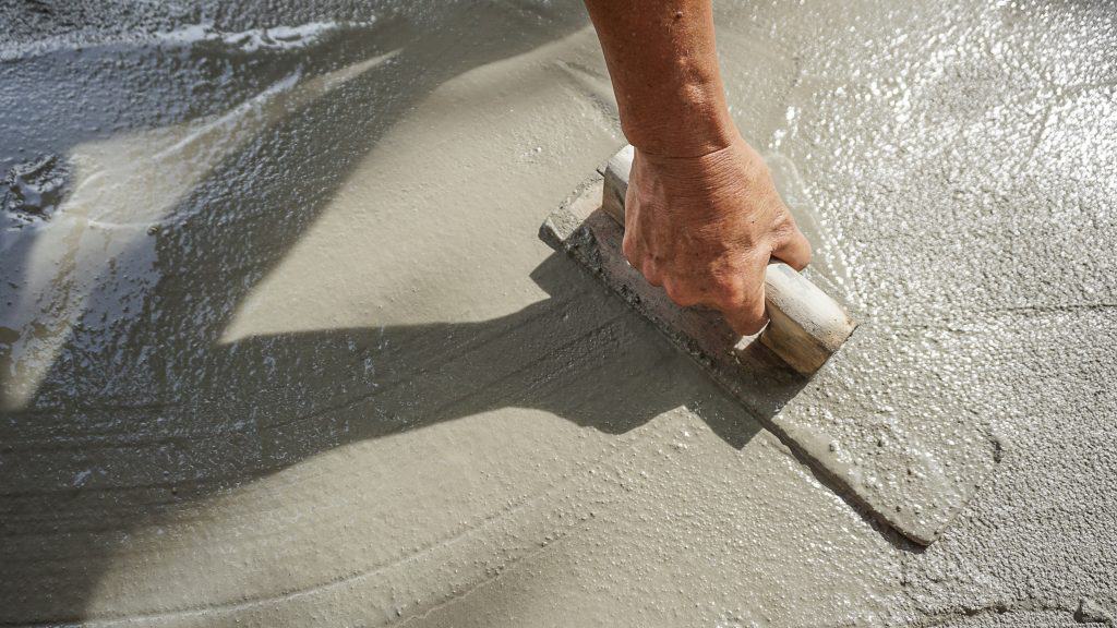 concrete greenhouse gas emissions, sustainable construction, carbon footprint, CO2 emissions, concrete admixtures, Cortec, MCI, Migrating Corrosion Inhibitors, LEED certification, From Grey to Green